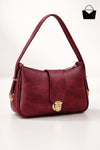 Red handbag with gold accents on a white background