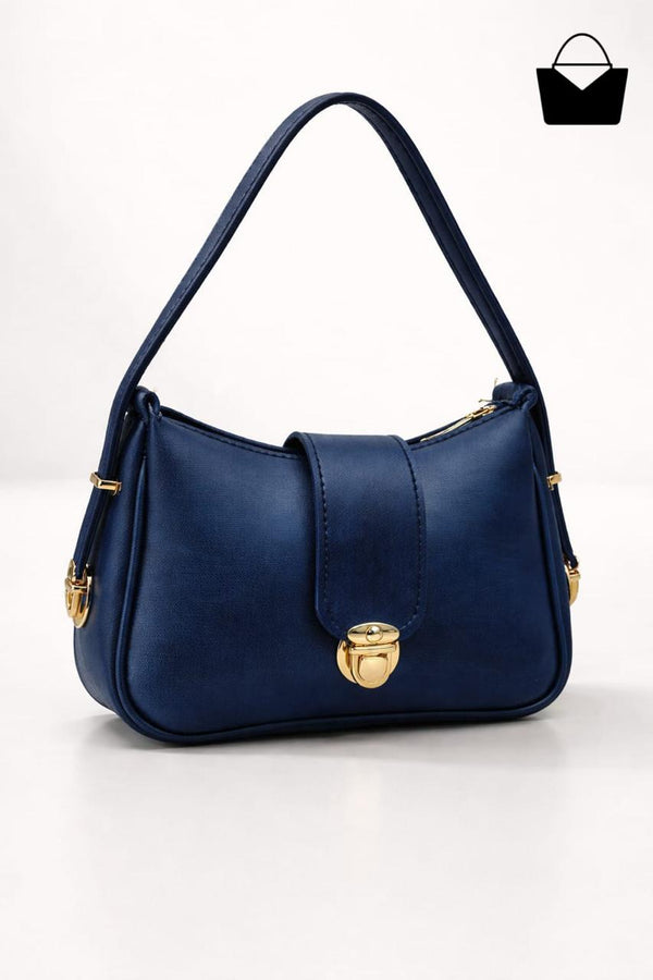 Blue handbag with gold accents on a white background